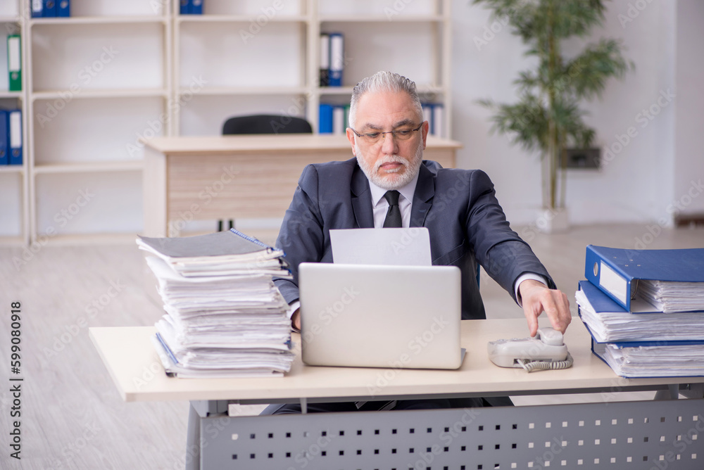 Old male employee and too much work at workplace