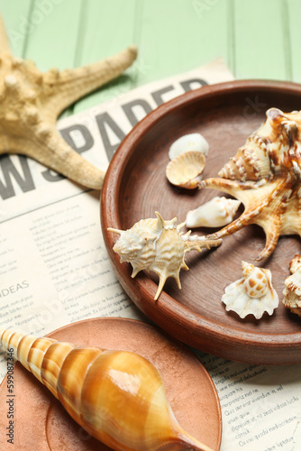Plate with sea shells and n...