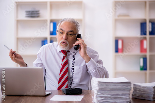 Old male employee and too much work in the office