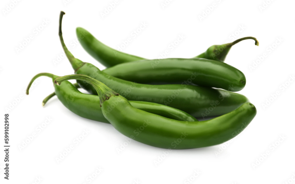 Green hot chili peppers on white background, closeup Green hot chili peppers on white background, closeup