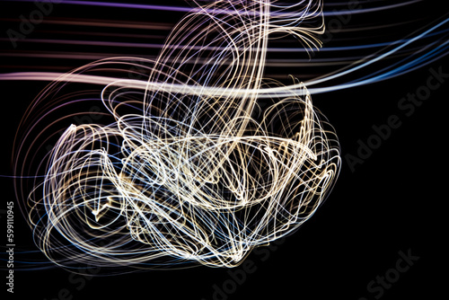 Curved lines formed by moving lights. traces of lights