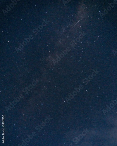 Photo background with a blue star galaxy theme at night