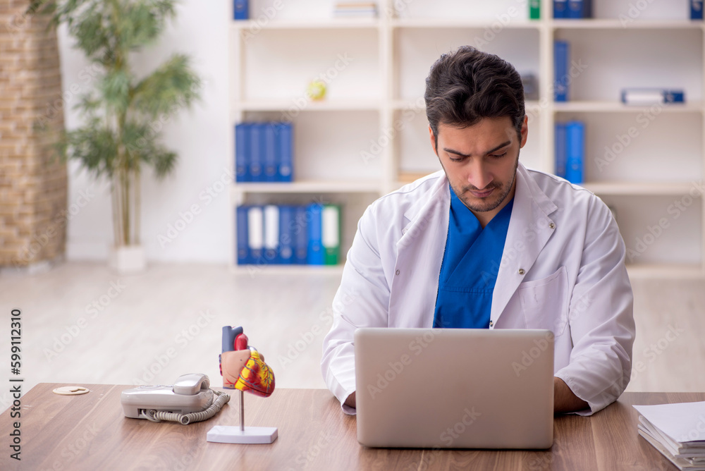 Young male doctor in telemedicine concept