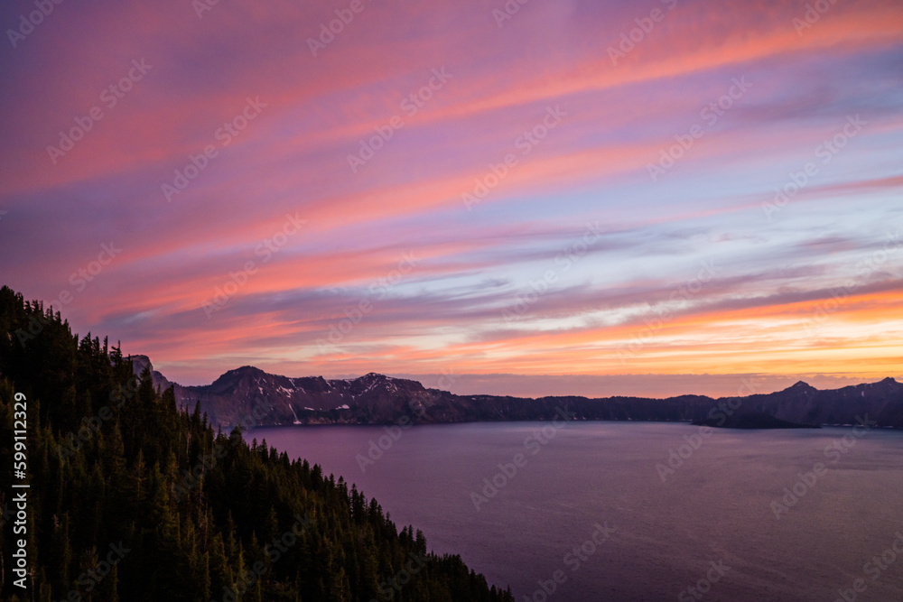 Pink Streaks Light up the Sky Over Crater Lake