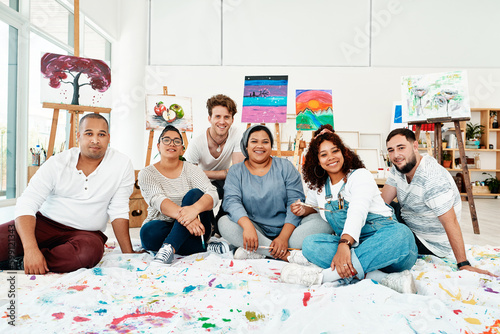 Heres to lifes greatest gift. Cropped portrait of a diverse group of friends posing together during an art class in the studio.
