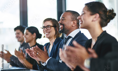 Theyre really impressed. a diverse group of young businesspeople applauding during a conference.