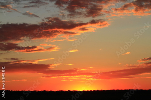  Kansas sunset in the sky with clouds