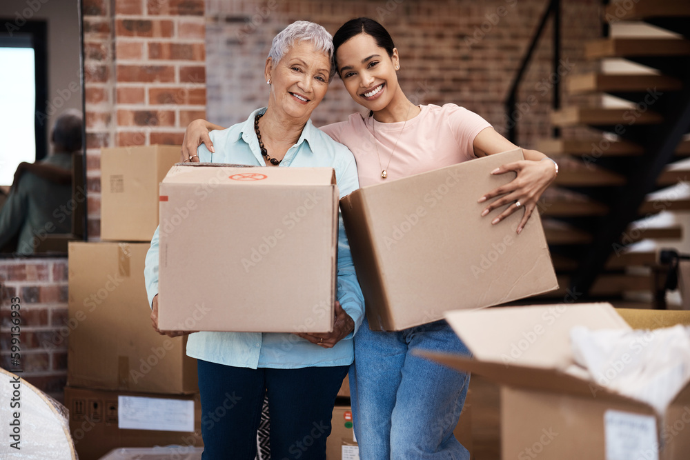 Time to fill a new home with memories. a senior woman moving house with help from her daughter.