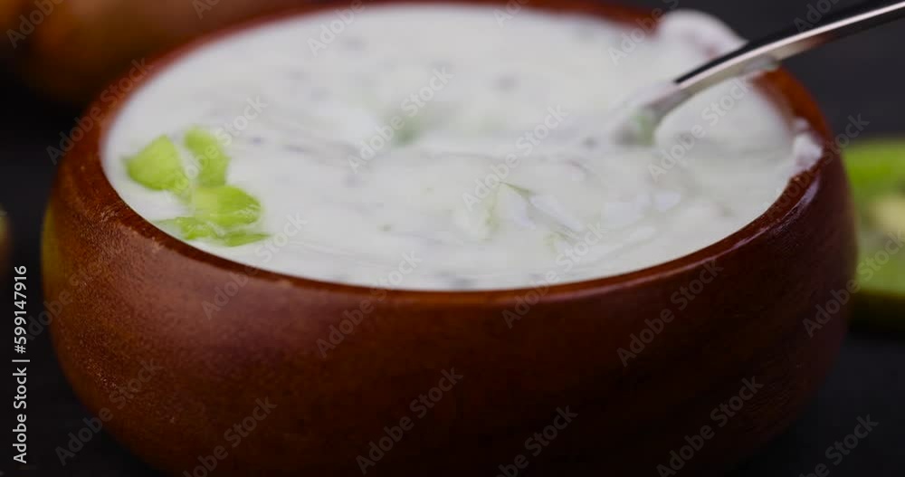 fresh yogurt made from natural ingredients with kiwi, milk fresh yogurt with kiwi flavor and kiwi slices fresh yogurt made from natural ingredients with kiwi, milk fresh yogurt with kiwi flavor and kiwi slices