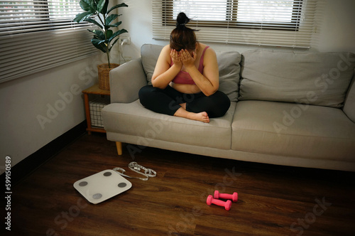 Fat woman with tight clothing worried about weight diet lifestyle concept.
