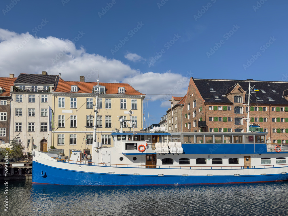 Naklejka premium Old boats -Walking along Copenhagen's canals on a beautiful spring day, Denmark, Europe