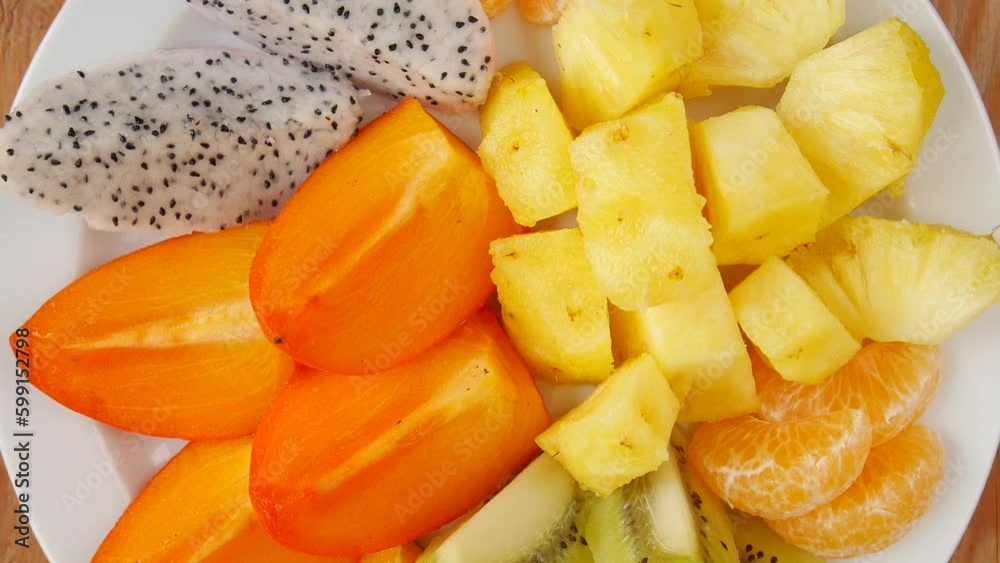 Sliced fruit on a plate. Sliced fruit on a plate.