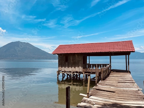 Fisherman house in the middle of lake with mountain view taken at South Sumatera  Indonesia