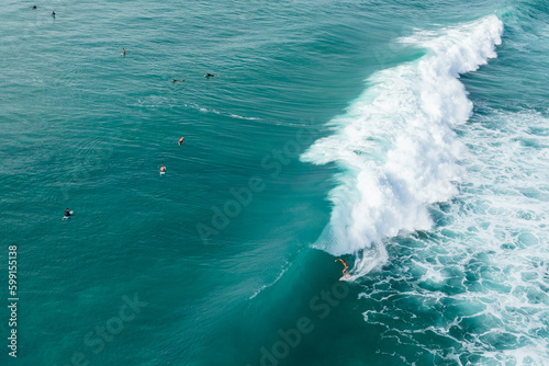Drone shot of surfers in Hawaii