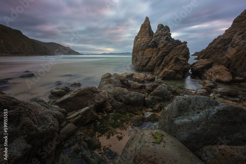 Campelo beach at sunset in Valdovino, Galician. Spain photo