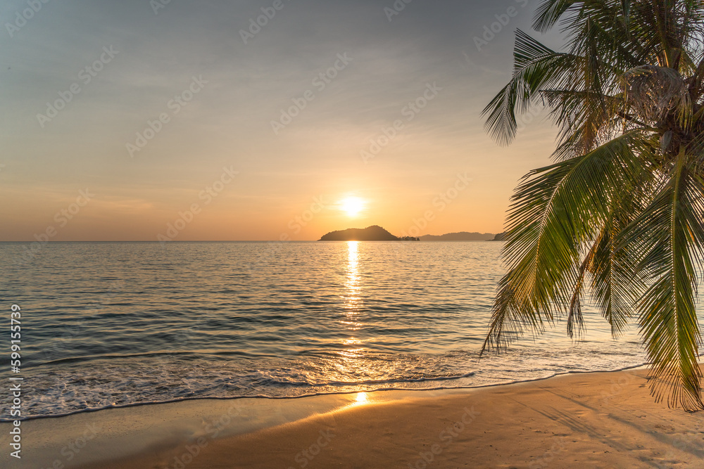 Golden hour at sunset on tropical beach