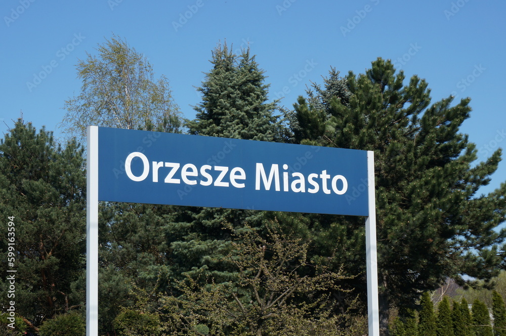 Fototapeta premium Railway station name signboard on platform. Orzesze, Poland.