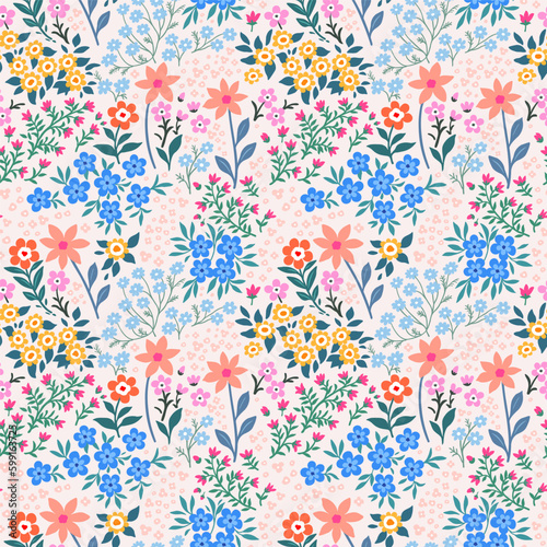 Seamless pattern. Vector flower design with cute wildflowers. Romantic abstract floral pattern on pale pink background. Illustrations of spring nature with red  blue and pink flowers.