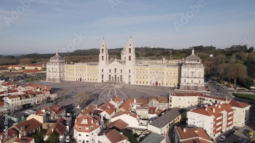 Aerial - Forward approach on national palace of mafra on sunny day in portugal photo
