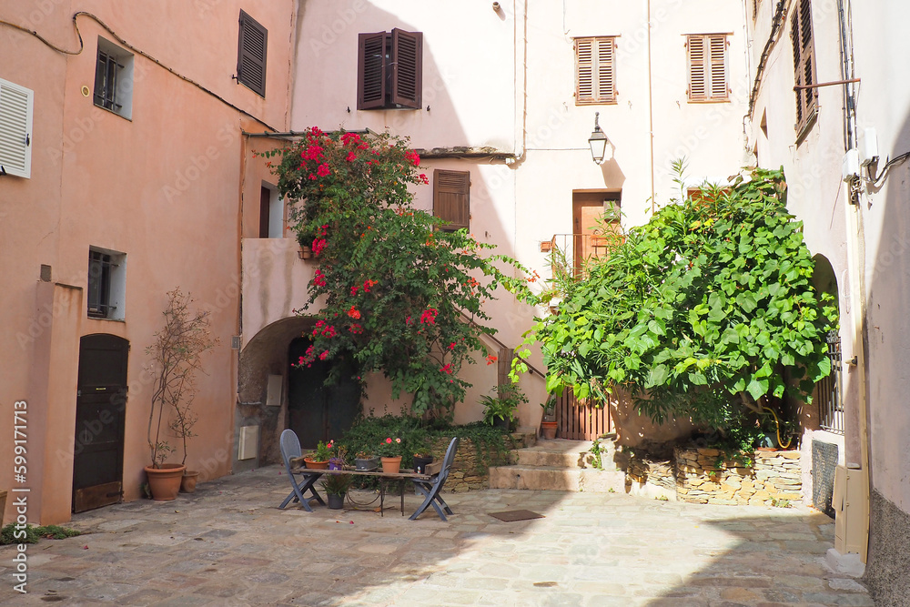 Naklejka premium One of the charms of the island of Corsica (nicknamed the Island of Beauty), in the heart of the Mediterranean Sea, are the small shaded terraces