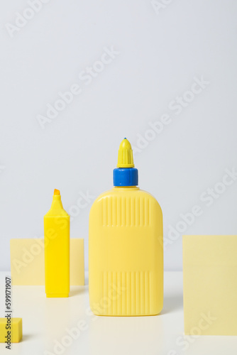 Concept of different office stationery with glue