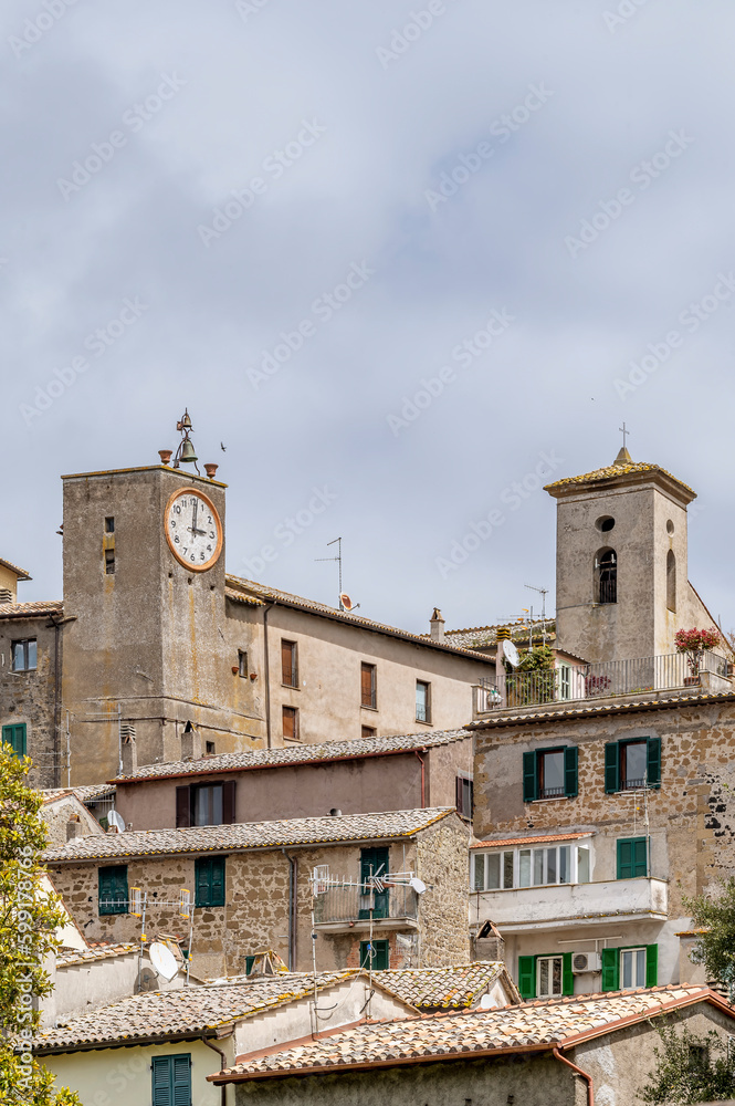 A glimpse of the historic center of Capodimonte, Italy, including the clock tower