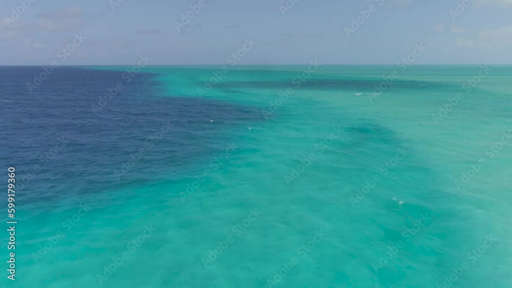Aerial Drone View of Bahamas Deserted Island Crystal Blue Water and Reef