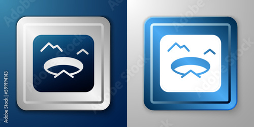 White Winter fishing icon isolated on blue and grey background. Round ice frame. Hole in ice. Silver and blue square button. Vector