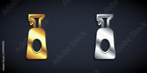 Gold and silver Cleaning spray bottle with detergent liquid icon isolated on black background. Long shadow style. Vector
