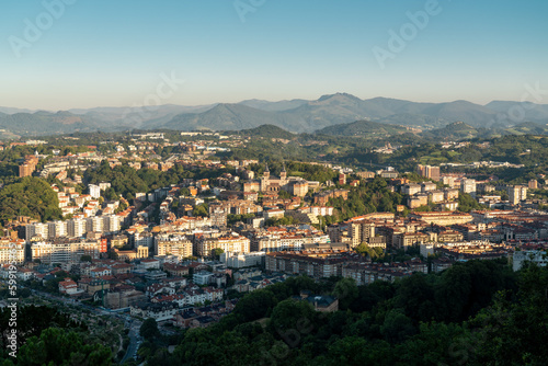 San Sebastian, SPAIN - July 09 2022: High angle view of San Sebastian - Donostia City. Travel destination in north of Spain in Vesque Country. View of city center. In background hills and mountains. © alexemarcel