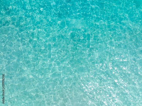 Fototapeta Naklejka Na Ścianę i Meble -  Aerial view of the Overhead view of crystal clear water on beach background