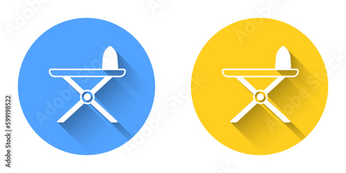 White Electric iron and ironing board icon isolated with long shadow background. Steam iron. Circle button. Vector