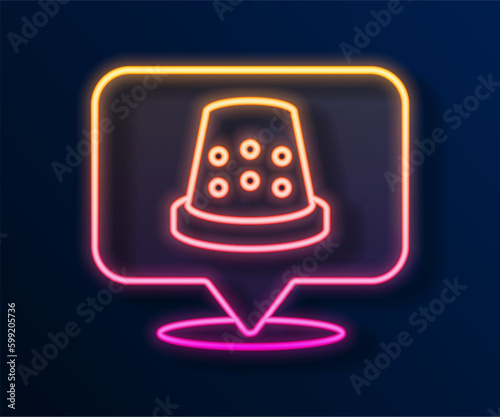Glowing neon line Thimble for sewing icon isolated on black background. Vector