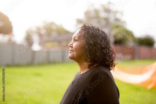 Portrait of Aboriginal woman alone in the afternoon photo