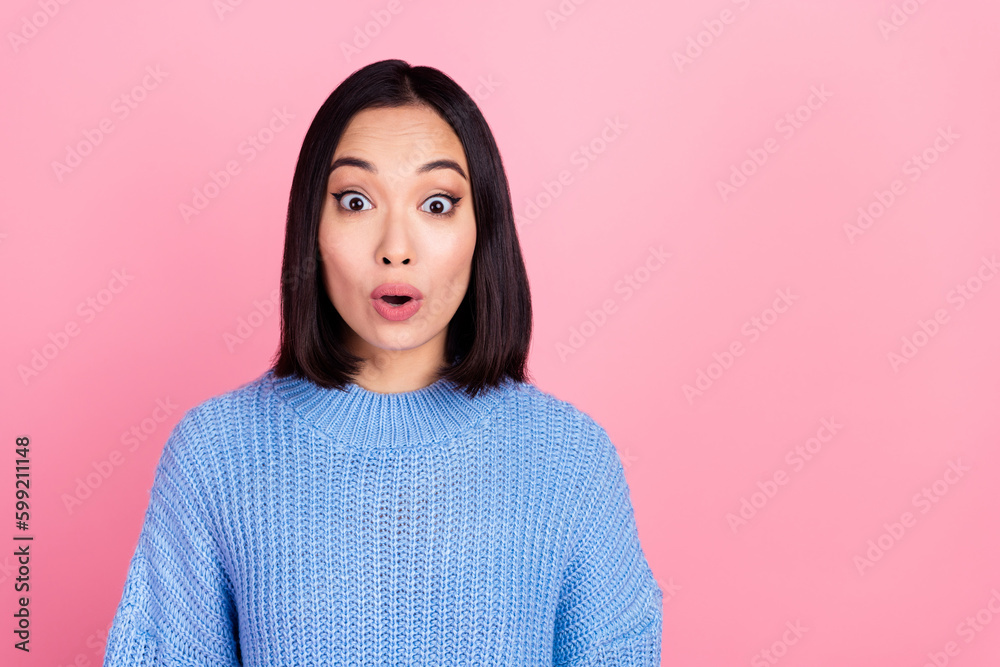 Portrait of impressed speechless lady open mouth empty space isolated on pink color background