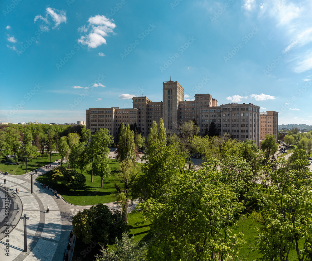 Spring aerial panoramic view on Karazin National University main building on Freedom (Svobody) Square with green park. Kharkiv, Ukraine Spring aerial panoramic view on Karazin National University main building on Freedom (Svobody) Square with green park. Kharkiv, Ukraine