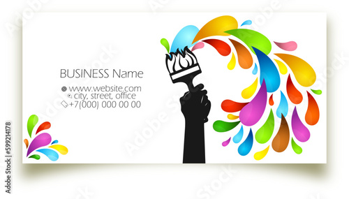 Paint brush in hand and a drop of splashes of colored paint. Business cardconcept for a painter