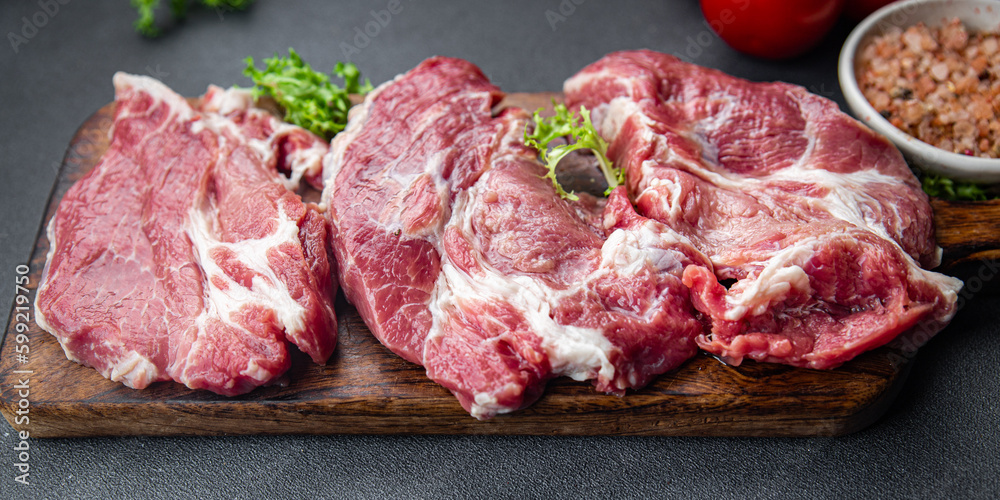 raw pork fresh meat healthy meal food snack on the table copy space food background rustic top view keto or paleo diet raw pork fresh meat healthy meal food snack on the table copy space food background rustic top view keto or paleo diet