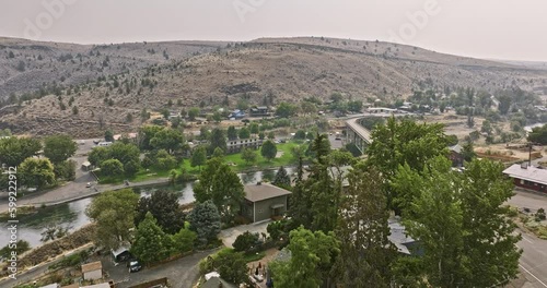 Maupin Oregon Aerial v5 flyover riverside town with Dalles-California highway bridge spanning across Deschutes river capturing beautiful countryside landscape - Shot with Mavic 3 Cine - August 2022 photo