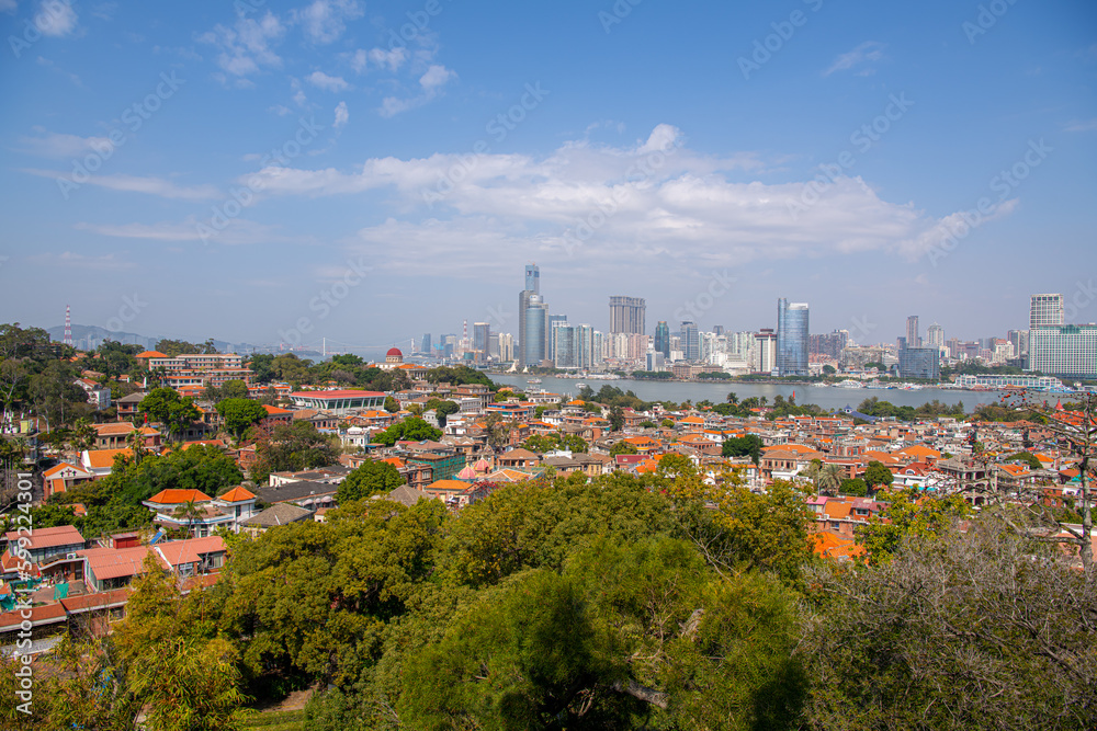 GULANGYU, XIAMEN, CHINA. February 21st, 2021: Xiamen panoramic scenery, aerial view from gulangyu island. Blue sky with copy space for text