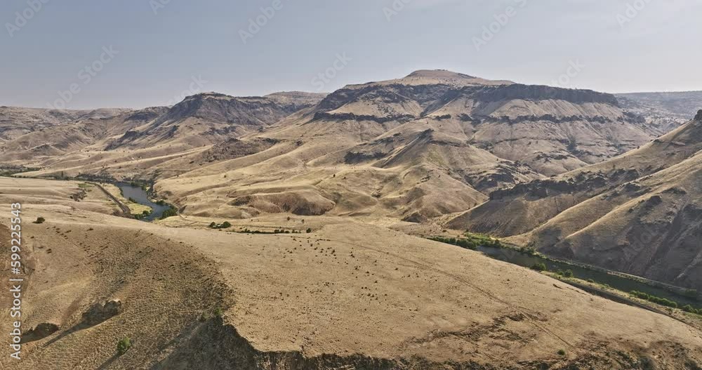 Deschutes River Oregon Aerial v81 cinematic drone flyover the region capturing barren canyon landscape of Deschutes river Antoken creek with railroad bridge - Shot with Mavic 3 Cine - August 2022 Deschutes River Oregon Aerial v81 cinematic drone flyover the region capturing barren canyon landscape of Deschutes river Antoken creek with railroad bridge - Shot with Mavic 3 Cine - August 2022