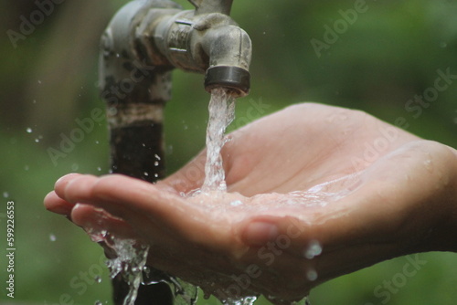 wash hands and take water for ablution