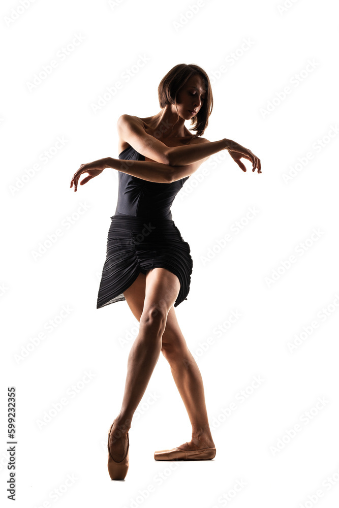ballerina with an elegant black dress posing against white background ballerina with an elegant black dress posing against white background