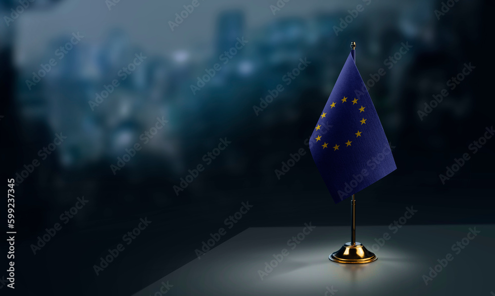 Small national flag of the European Union on a black background - obrazy, fototapety, plakaty 