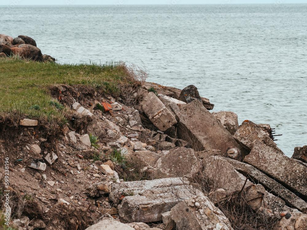 The nature of Latvia, the Gulf of Riga, pier, stone concrete