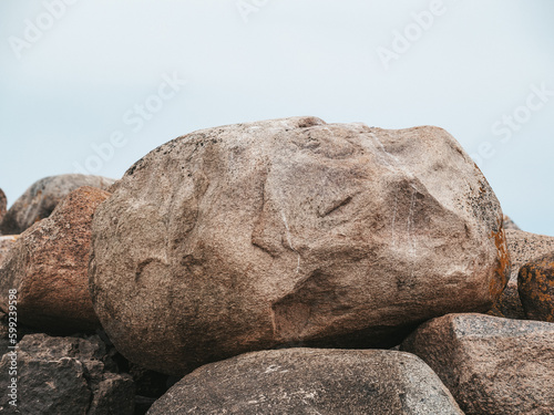 Nature of Latvia, pier with large stones photo
