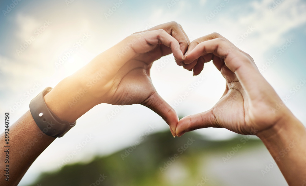 Go where your heart takes you. Closeup shot of an unrecognizable couple making a heart shape with their hands outdoors. Go where your heart takes you. Closeup shot of an unrecognizable couple making a heart shape with their hands outdoors.