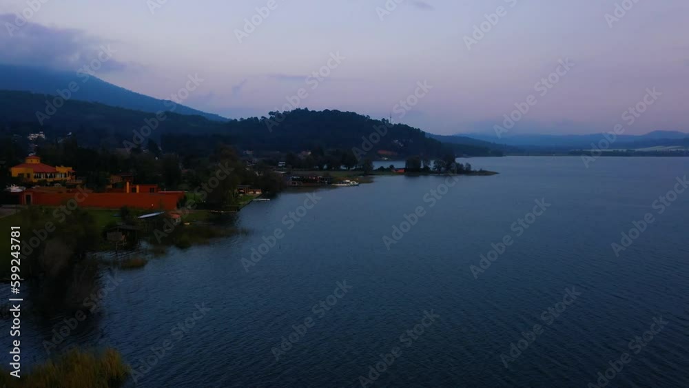 Lake Tzirahuen in Michoacán, Mexico, captivates with its natural beauty: crystal clear waters surrounded by mountains, a serene and enchanting paradise Lake Tzirahuen in Michoacán, Mexico, captivates with its natural beauty: crystal clear waters surrounded by mountains, a serene and enchanting paradise