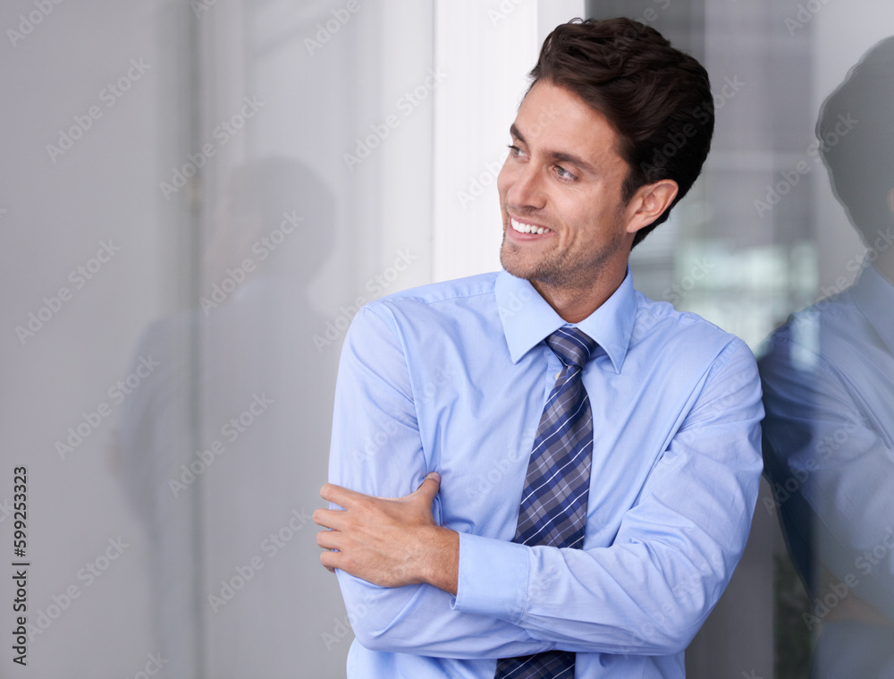 Ready for business. A confident young businessman in his office. Ready for business. A confident young businessman in his office.
