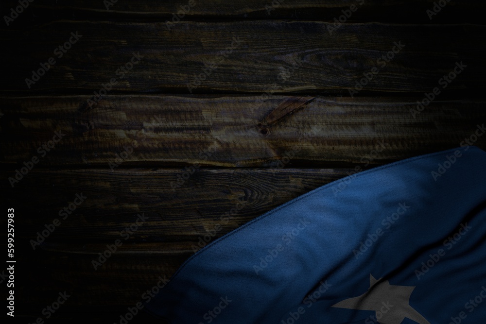 beautiful dark photo of Somalia flag with big folds on old wood with free place for your text - any occasion flag 3d illustration.. beautiful dark photo of Somalia flag with big folds on old wood with free place for your text - any occasion flag 3d illustration..